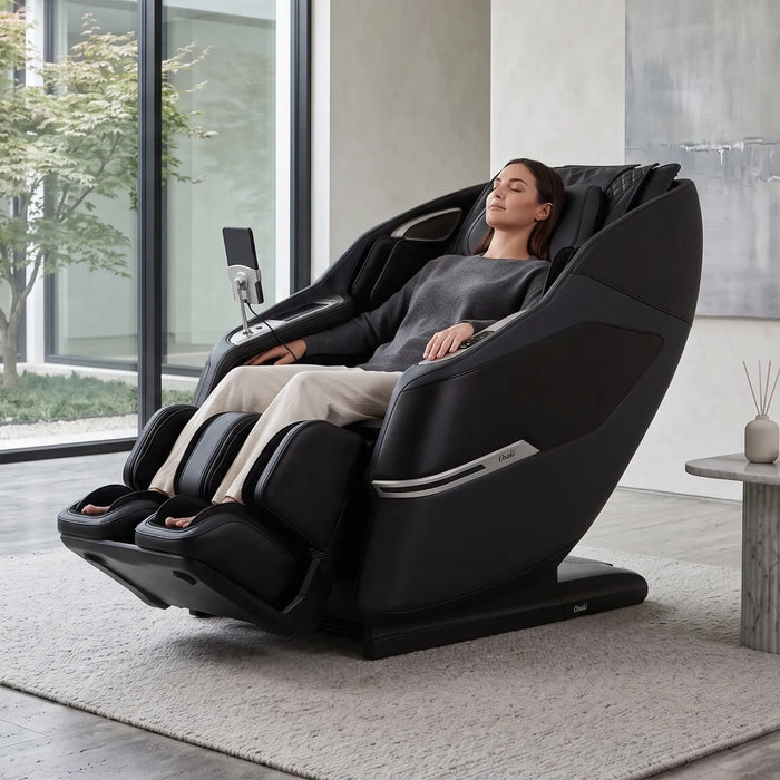 Osaki Aeris 4D Duo massage chair in Black with model - MassageChairPlanet.com