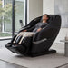 Osaki Aeris 4D Duo massage chair in Black with model - MassageChairPlanet.com
