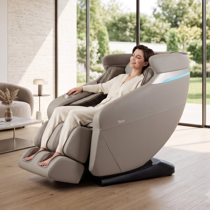 Titan Forma 3D+2D massage chair in Taupe with model - MassageChairPlanet.com