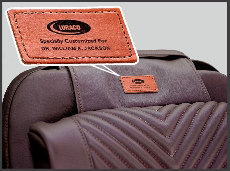 Luraco iRobotics 11 (i11) Special Edition Medical Massage Chair – close-up of custom leather name tag on headrest